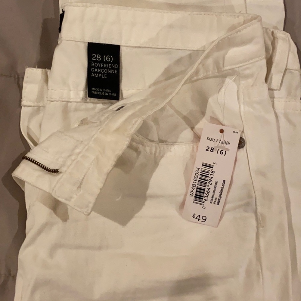 Distressed white boyfriend jeans